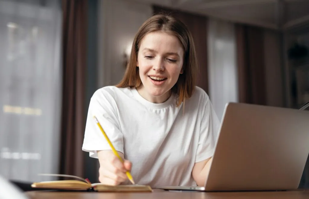 A coachee completing a homework assignment set by a coach